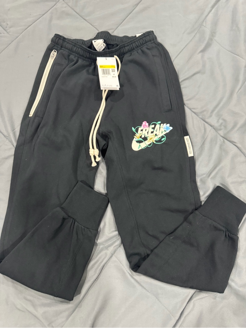 Nike Black Men’s Sweatpants with Colorful Floral 'Dream' Graphic